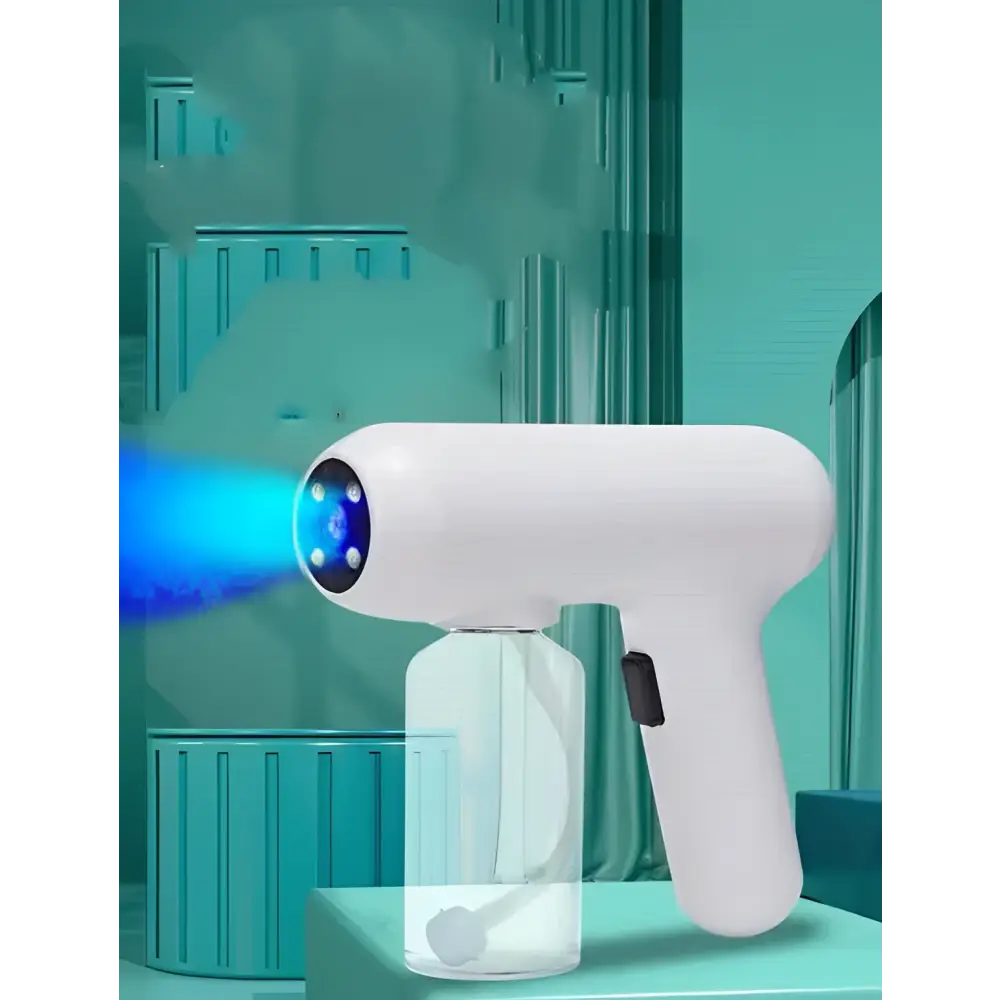 White handheld k5 pro electric sanitizer sprayer with transparent liquid reservoir and blue light disinfection gun nozzle