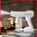 White plastic gun-shaped k5 pro electric sanitizer sprayer with clear liquid reservoir and red atomizer branding for disinfection gun use