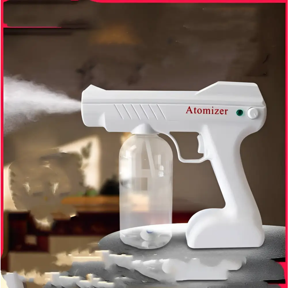 White plastic gun-shaped k5 pro electric sanitizer sprayer with clear liquid reservoir and red atomizer branding for disinfection gun use