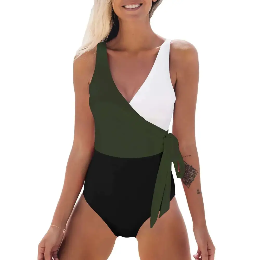Olive green white and black knotted color block one piece swimsuit with draped knot detail on the side