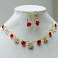 Gold-toned korean bridal jewelry red rose necklace set with matching earrings featuring clear crystal flower charms