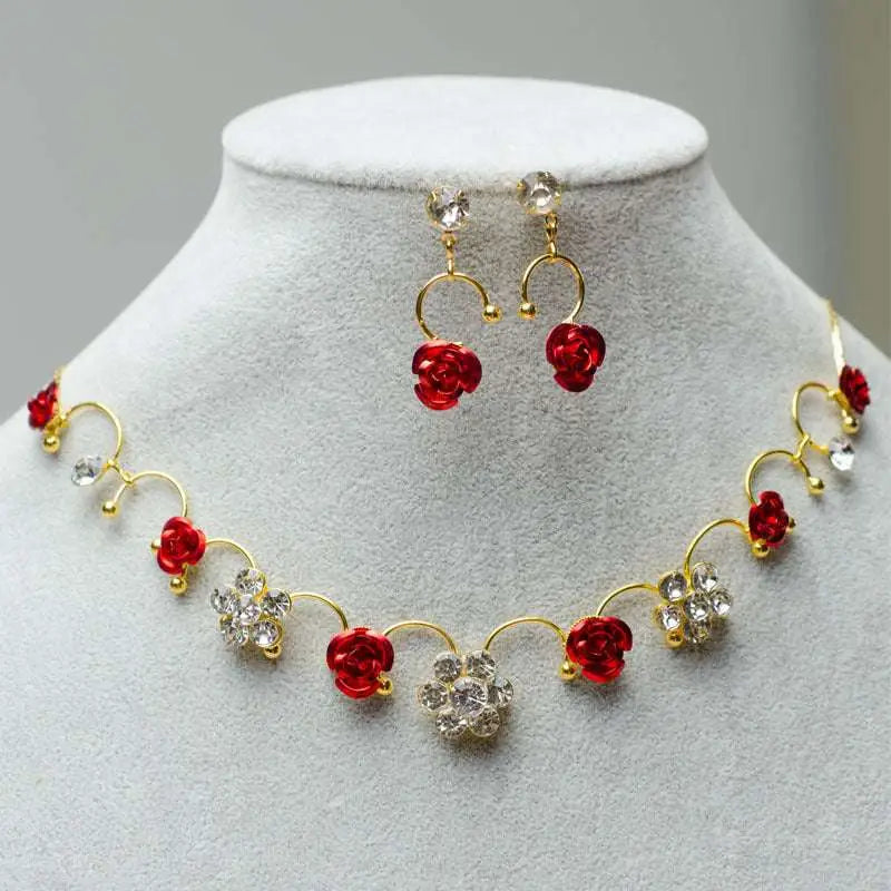 Gold-toned korean bridal jewelry red rose necklace set with matching earrings featuring clear crystal flower charms