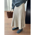 Beige korean elastic waist pleated midi skirt with ribbed knit fabric and soft flowing silhouette