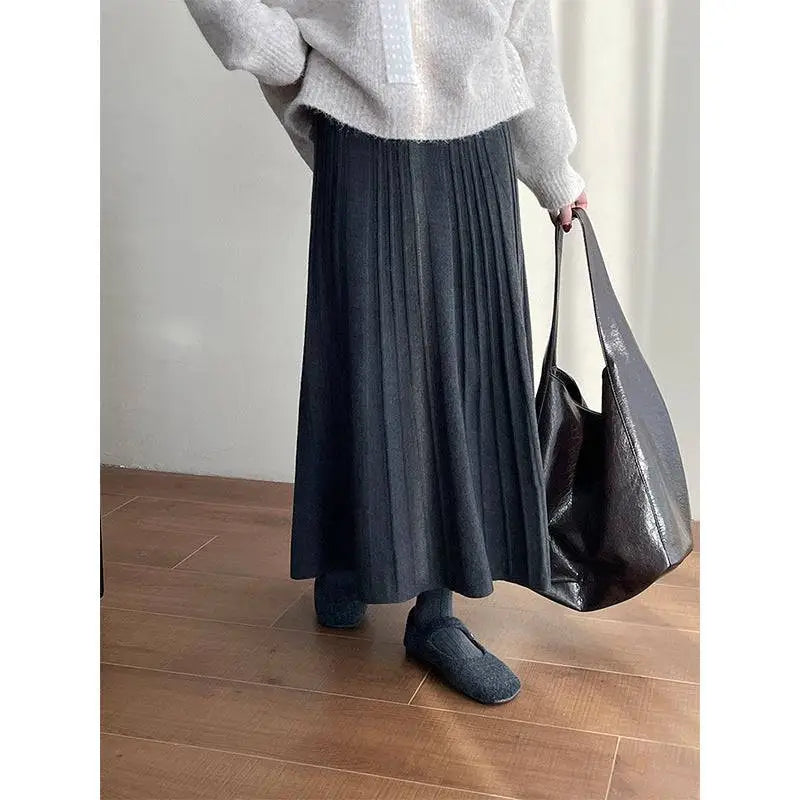 Dark gray korean elastic waist knitted pleated midi skirt with soft textured fabric and subtle vertical ridges