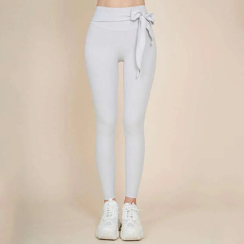 Light gray high waisted bow leggings in korean fashion high style designed for nude sports yoga and casual wear