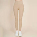 Beige high waisted bow yoga pants in smooth stretchy fabric for nude sports yoga in korean fashion high style
