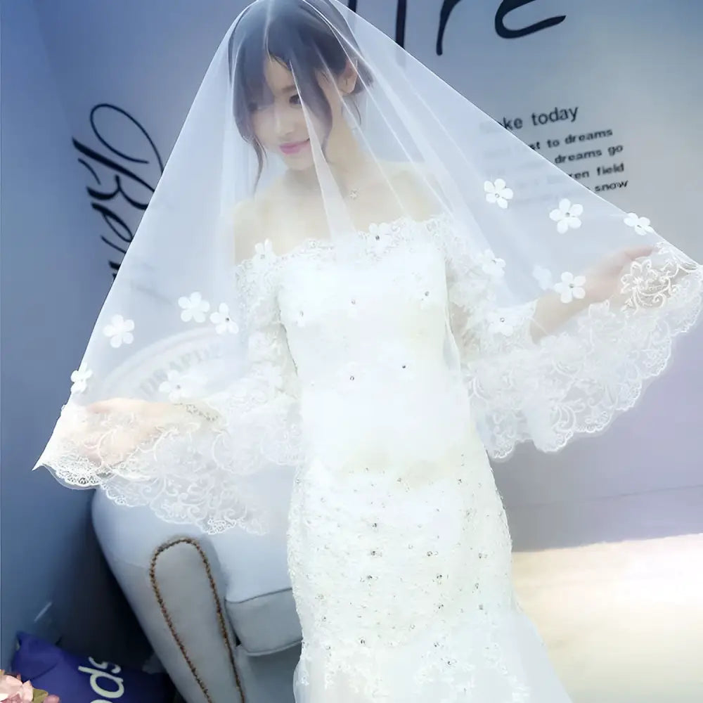 White korean lace petal bridal veil featuring delicate floral appliqués and scalloped edges for weddings
