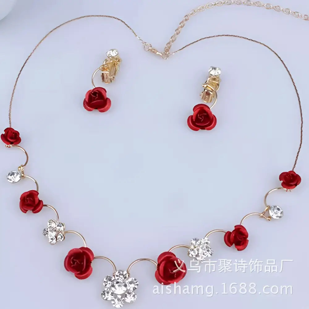 Red rose necklace featuring a bride red rose pendant with clear crystal accents on a korean small clear gold-tone chain