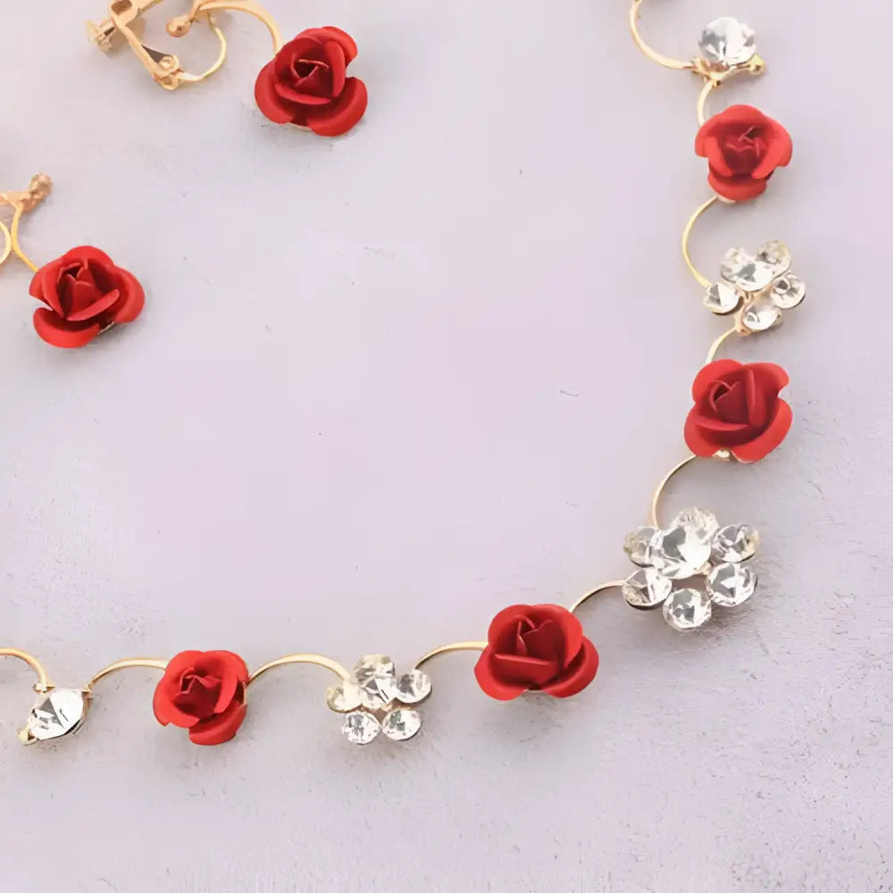 A delicate korean small clear bride red rose necklace with gold tone featuring red rose charms and crystal flower clusters