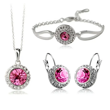 Korean style jewelry set featuring silver-toned pieces with a central pink crystal and smaller clear crystals