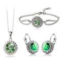 Silver-toned korean style jewelry set featuring a central emerald-green crystal surrounded by smaller clear crystals