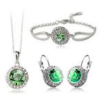 Silver-toned korean style jewelry set featuring a central emerald-green crystal surrounded by smaller clear crystals