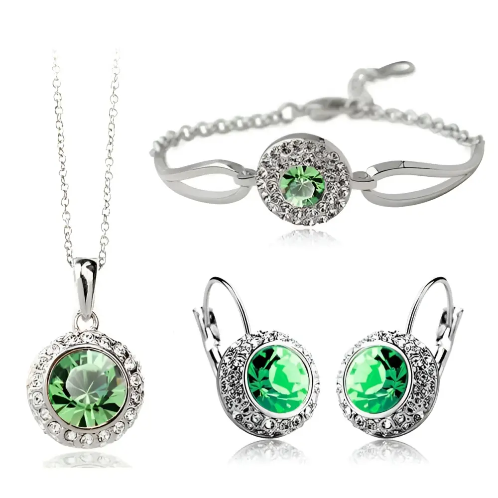 Silver-toned korean style jewelry set featuring a central emerald-green crystal surrounded by smaller clear crystals
