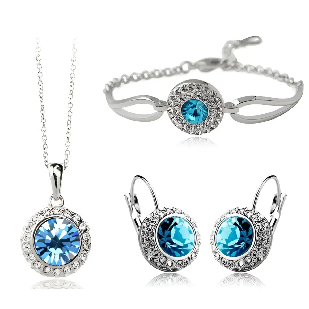 Silver-toned korean style jewelry set featuring a central blue crystal and smaller clear crystals on each piece