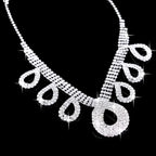 A korean wedding silver rhinestone necklace with intricate patterns and teardrop charms for dress accessories jewelry