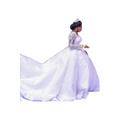 A woman wearing a white lace african wedding dress with long sleeves and an elaborate train for african weddings