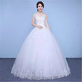 White sleeveless wedding gown with beaded floor length design and intricate lace detailing along the hem