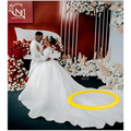 Yellow circular ring on the white lace ball gown wedding dress long sleeves train back side view
