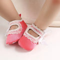 Pink baby toddler shoes featuring white lace trim and bows lace bow princess design for delicate wear