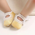 Soft yellow satin princess shoes baby with delicate white lace bow trim perfect for baby toddler shoes
