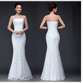 White lace mermaid wedding dress fuchsia with a strapless fitted bodice and back corset detailing visible from the back side