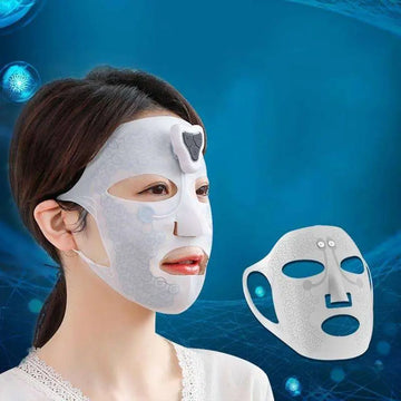 White electric facial massage mask with intricate swirling lace pattern and black sensor pad on forehead for facial massage