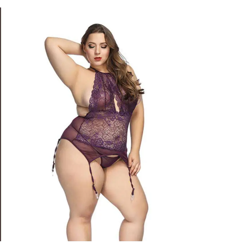 A plus size woman models a deep purple sheer lace plus size bodysuit with halter neckline and adjustable thigh ties
