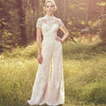 White lace bride pants suit with short sleeves and intricate floral embroidery suit wedding jumpsuit style