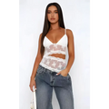 White lace stitched backless small sling v neck tank top with delicate floral embroidery and thin spaghetti straps