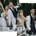 White lace wedding dress with intricate beaded embellishments and sheer veil for lace summer couple photo shoot