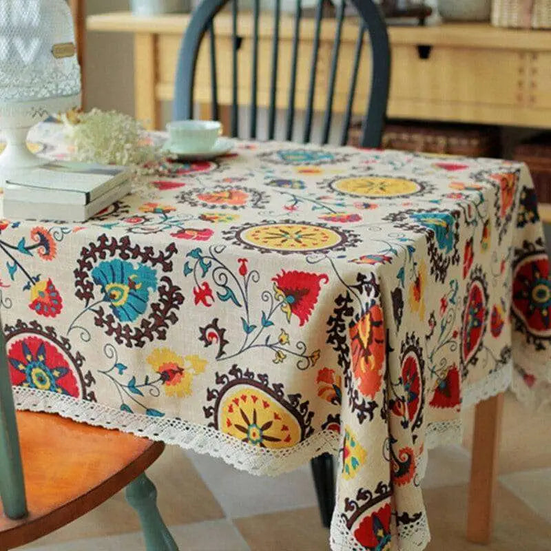 Beige lace trim sunflower cotton linen table cloth with vibrant floral and circular patterns in red blue yellow and brown