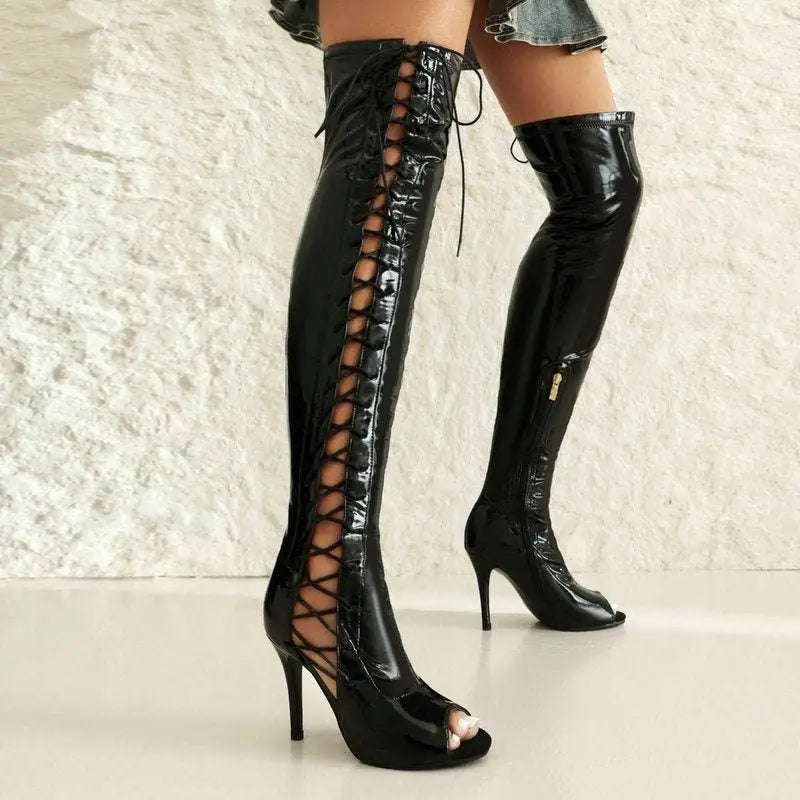 Black patent leather over the knee boots with lace up sides and peep toe design for stylish wear