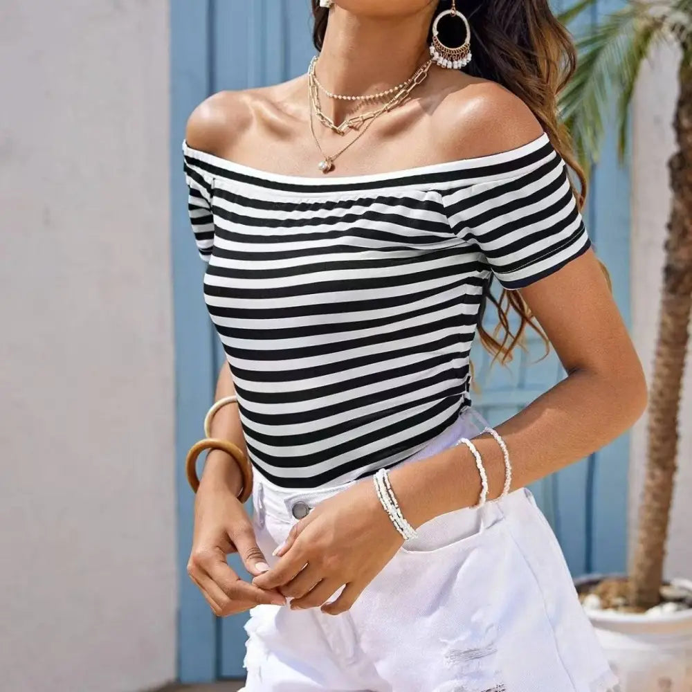 Black and white horizontally striped off shoulder shirt with short sleeves in luxury women’s fashion style