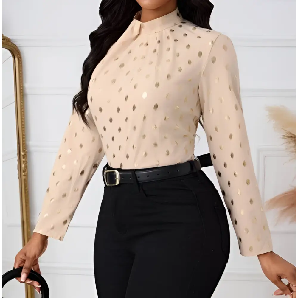 Beige ladies polka dot pleated high neck blouse with gold polka dots and long sleeves for elegant wear
