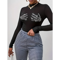 Black long sleeved mesh top with sparkling skeleton hand designs for a ladies printed fashionable look
