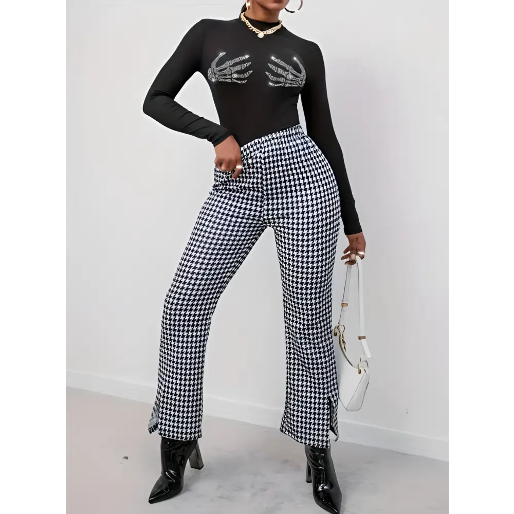 Black and white houndstooth patterned high waisted flared pants with side slits for ladies printed fashionable wear