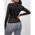 Ladies printed fashionable black ribbed long sleeved top with high neckline and fitted waistband for stylish wear