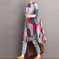 A ladies retro casual high waist tunic shirt top in vibrant pink teal navy blue and white geometric pattern