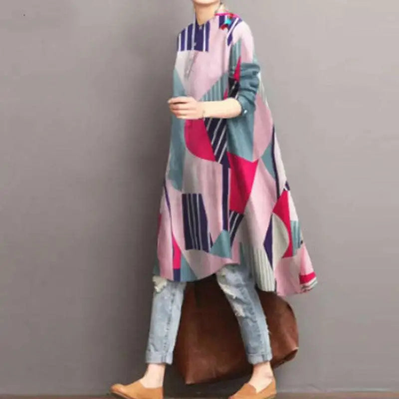 A ladies retro casual high waist tunic shirt top in vibrant pink teal navy blue and white geometric pattern