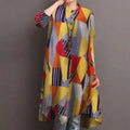 A ladies retro casual high waist tunic dress with vibrant yellow red purple and gray geometric pattern and relaxed fit