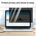 Black laptop privacy screen protector with diagonal gray stripes made of waterproof matte film for secure viewing