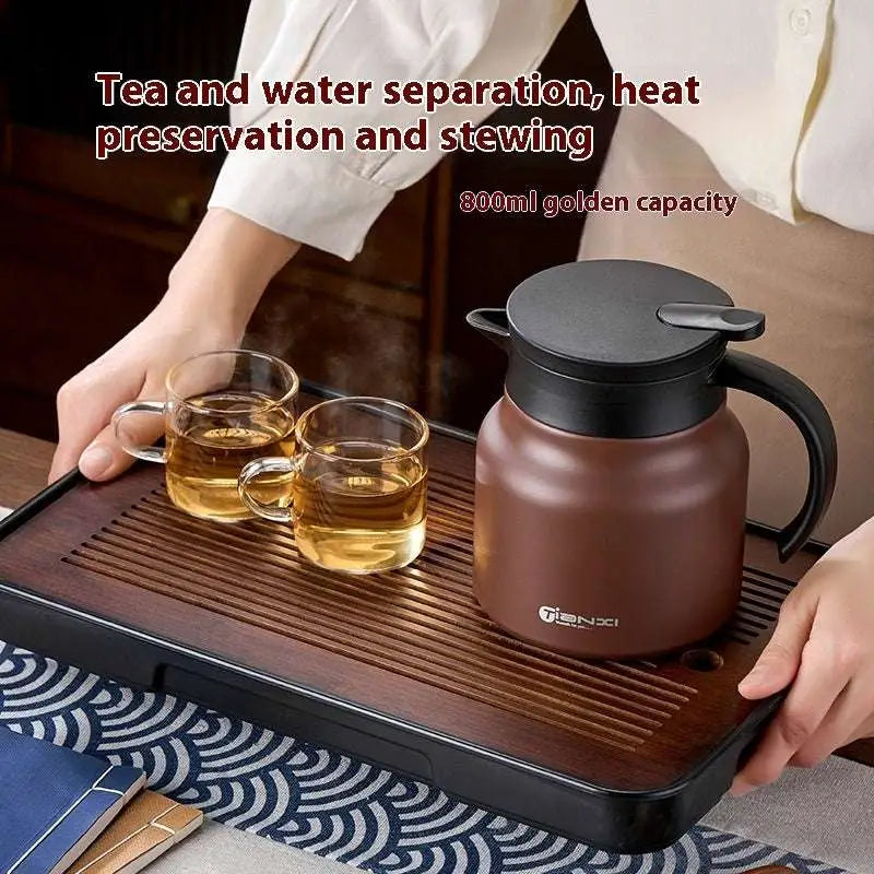 Brown insulated stainless steel large capacity tea water separation carafe with black lid and handle for modern use