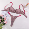 A mauve satin lavender and pink see-through two-piece set with vibrant pink straps made from comfortable fabric