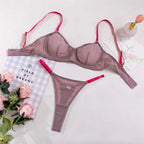 A mauve satin lavender and pink see-through two-piece set with vibrant pink straps made from comfortable fabric