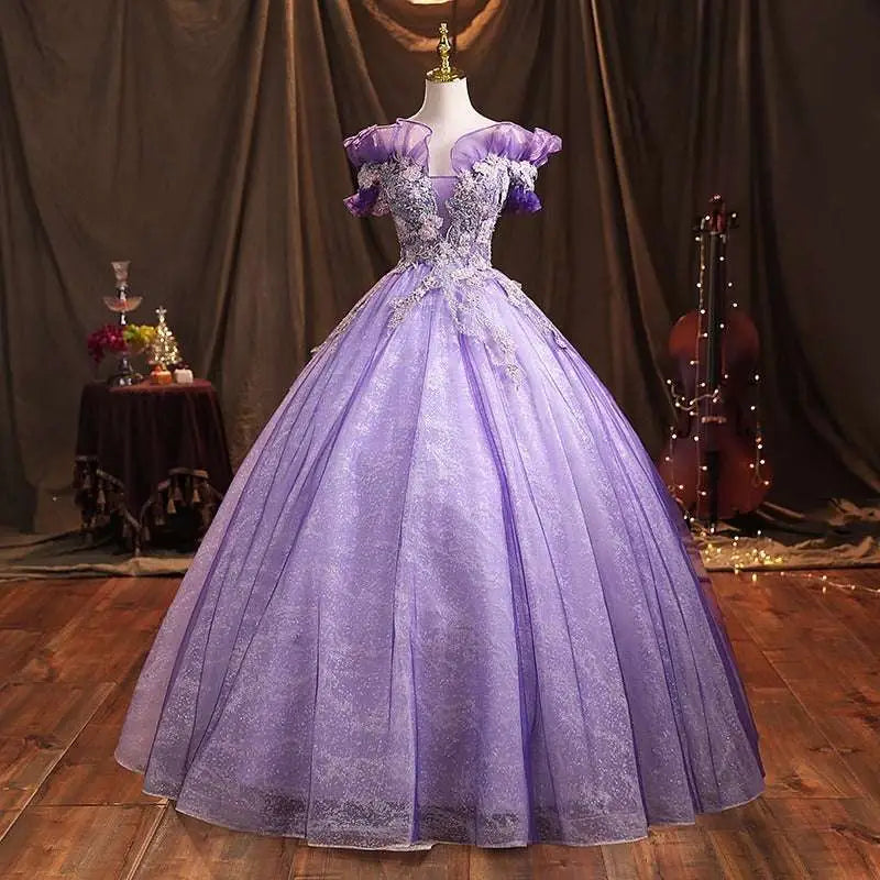 Lavender beaded bel canto solo performance costume featuring off-the-shoulder puffed sleeves and silver beading