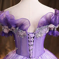 Lavender beaded bel canto solo performance costume with off-the-shoulder ball gown, sheer ruffled sleeves, and lace-up back corsetry