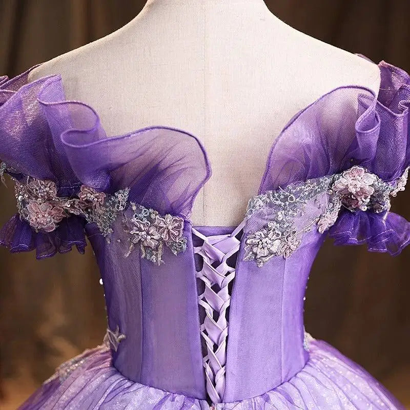 Lavender beaded bel canto solo performance costume with off-the-shoulder ball gown, sheer ruffled sleeves, and lace-up back corsetry