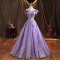 Lavender beaded bel canto solo performance costume featuring an off the shoulder lace ball gown with voluminous tulle skirt