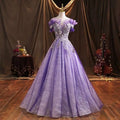 Elegant lavender beaded bel canto solo performance costume with off-the-shoulder ruffled sleeves and intricate lace detailing
