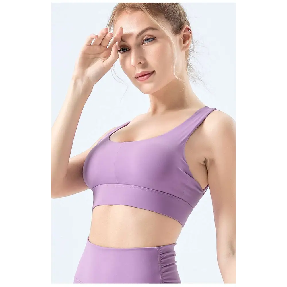 Lavender fitness bra with nylon fabric seamless design and supportive band for comfortable athletic use